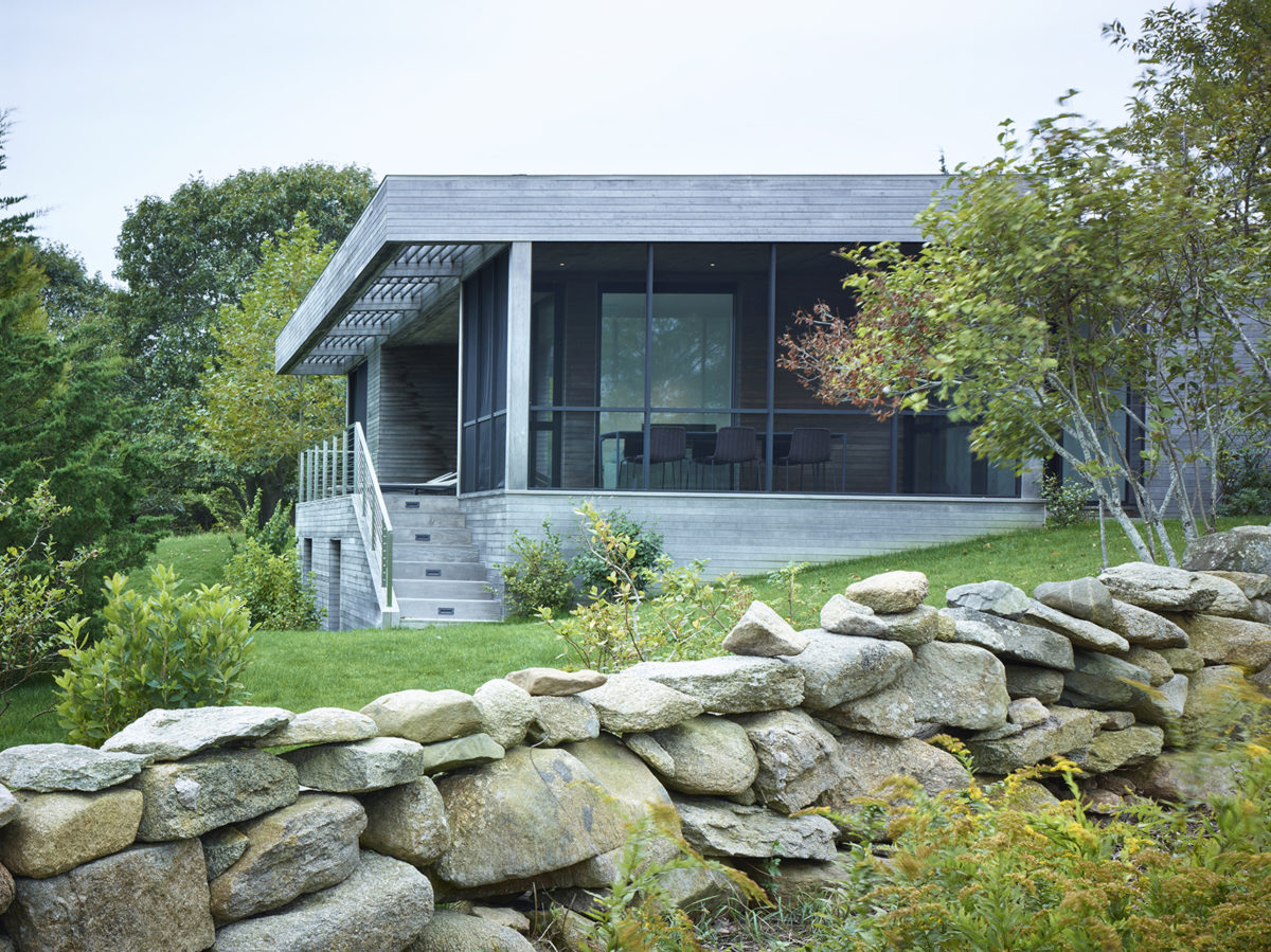 stone wall beyond the exterior of hillside haven